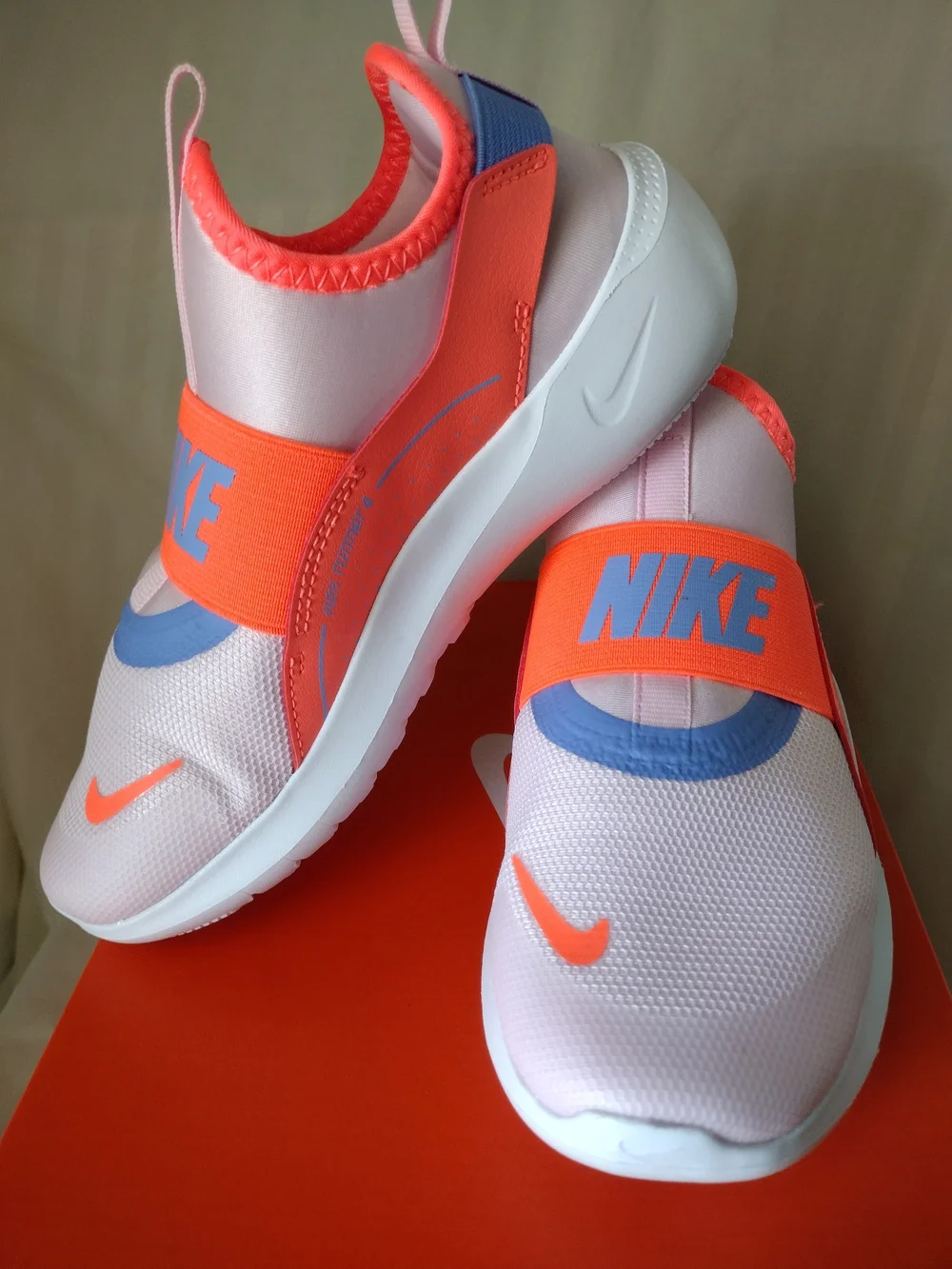 Nike Kids Slip-On Sneakers in White, Coral, Lavender